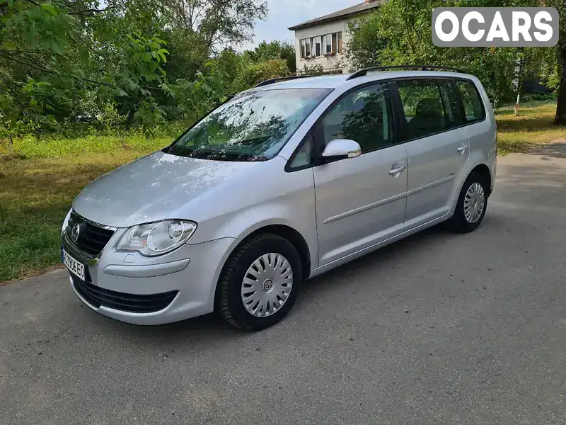 Минивэн Volkswagen Touran 2008 2 л. Ручная / Механика обл. Днепропетровская, Каменское (Днепродзержинск) - Фото 1/21