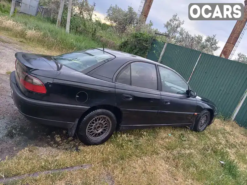 W0L000026R1100912 Opel Omega 1994 Седан  Фото 6