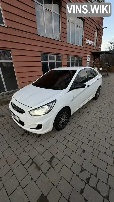 Седан Hyundai Accent 2013 1.4 л. Ручна / Механіка обл. Івано-Франківська, Верховина - Фото 1/15