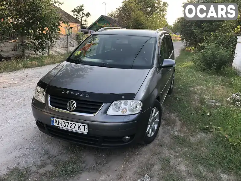 Мінівен Volkswagen Touran 2006 1.97 л. Автомат обл. Дніпропетровська, Дніпро (Дніпропетровськ) - Фото 1/12