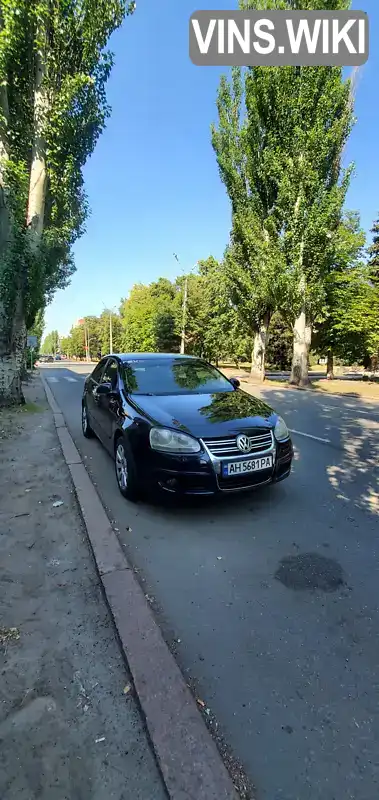 Седан Volkswagen Jetta 2009 1.6 л. Автомат обл. Донецька, Слов'янськ - Фото 1/9