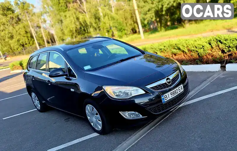 W0LPE8EA5C8098480 Opel Astra 2012 Универсал 1.3 л. Фото 1