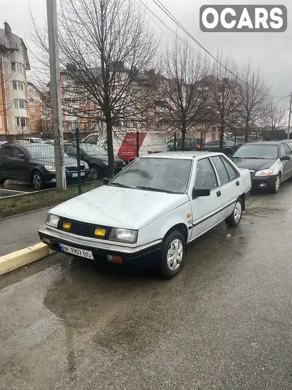 Седан Mitsubishi Lancer 1987 1.3 л. Ручна / Механіка обл. Київська, Буча - Фото 1/17