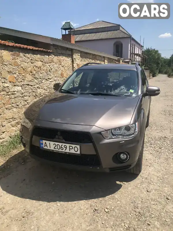 Внедорожник / Кроссовер Mitsubishi Outlander XL 2010 2.2 л. Автомат обл. Винницкая, Могилев-Подольский - Фото 1/21