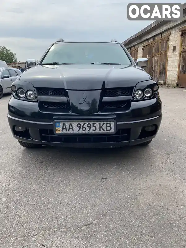 Позашляховик / Кросовер Mitsubishi Outlander 2004 2.38 л. Автомат обл. Київська, Біла Церква - Фото 1/21