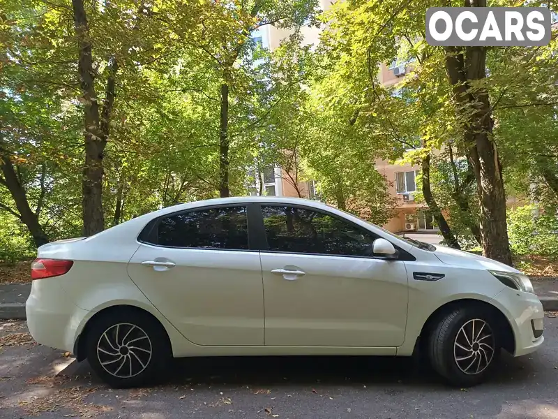 Седан Kia Rio 2013 1.4 л. Ручна / Механіка обл. Київська, Київ - Фото 1/19