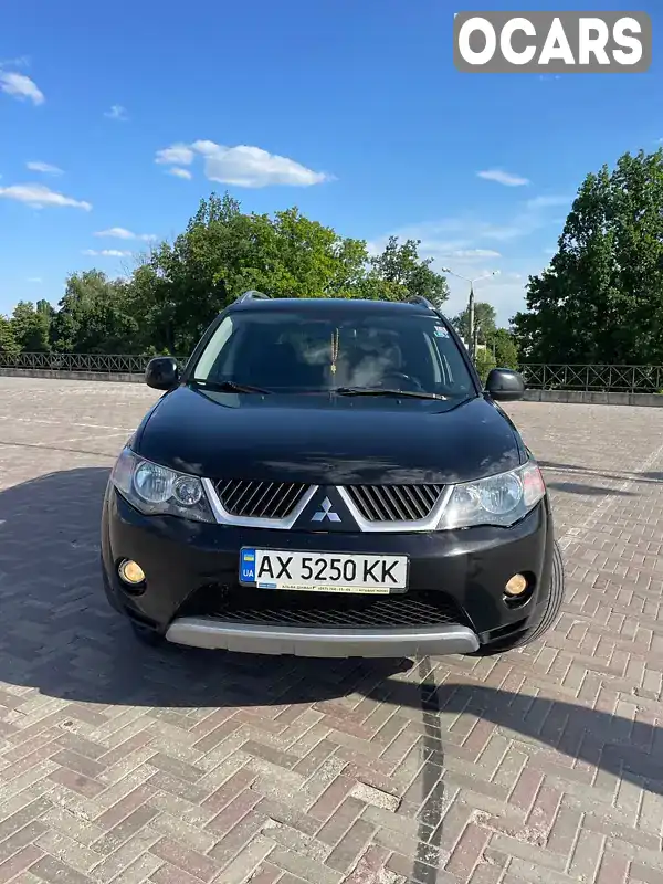 Внедорожник / Кроссовер Mitsubishi Outlander XL 2008 2.36 л. Автомат обл. Харьковская, Харьков - Фото 1/15