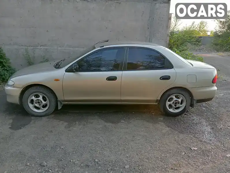 JMZBA125200393730 Mazda 323 1996 Седан 1.5 л. Фото 4