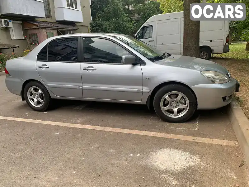 Седан Mitsubishi Lancer 2008 1.6 л. Ручна / Механіка обл. Закарпатська, Мукачево - Фото 1/10