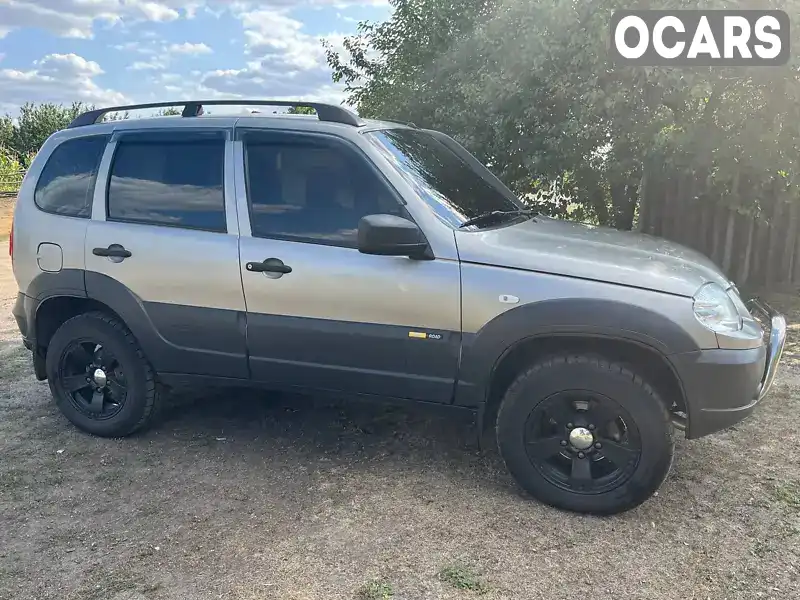 Позашляховик / Кросовер Chevrolet Niva 2016 1.69 л. Ручна / Механіка обл. Харківська, Близнюки - Фото 1/10