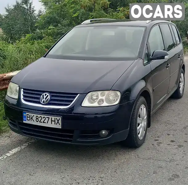 Мінівен Volkswagen Touran 2005 1.9 л. Автомат обл. Рівненська, Дубровиця - Фото 1/14