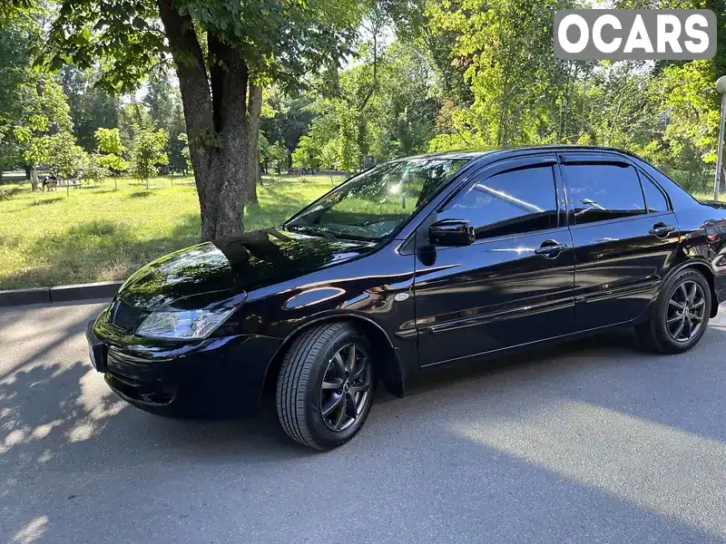 Седан Mitsubishi Lancer 2007 1.6 л. Автомат обл. Полтавська, Полтава - Фото 1/21