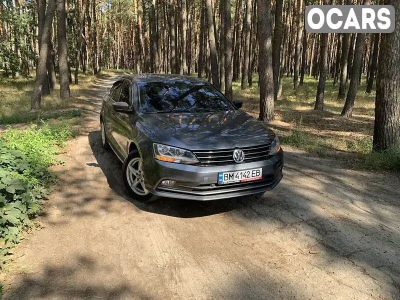 Седан Volkswagen Jetta 2015 1.4 л. Автомат обл. Сумська, Суми - Фото 1/21