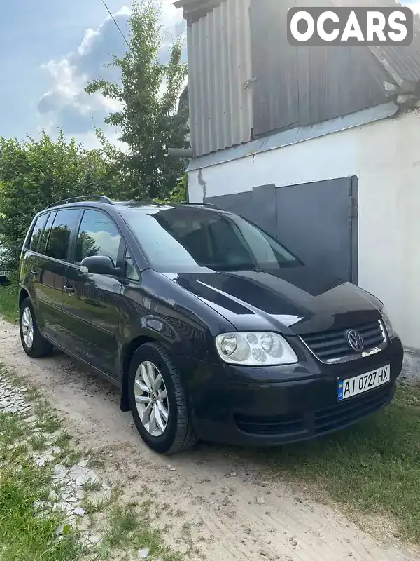 Мінівен Volkswagen Touran 2004 1.97 л. Ручна / Механіка обл. Київська, Бровари - Фото 1/12