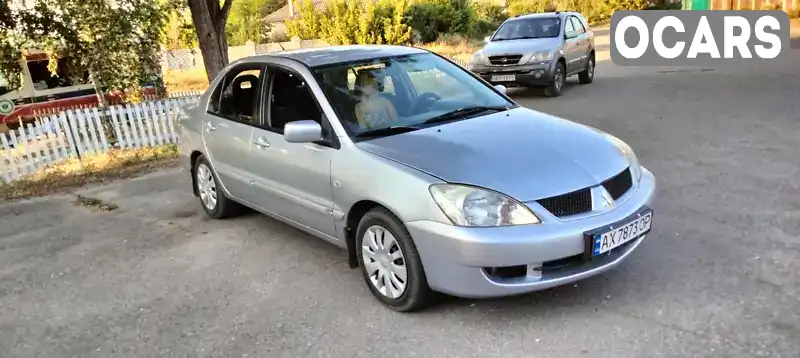 Седан Mitsubishi Lancer 2006 1.6 л. Ручна / Механіка обл. Харківська, Ізюм - Фото 1/9