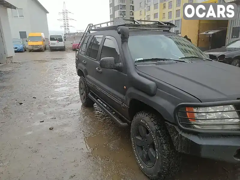 1J8G2E8A94Y102593 Jeep Grand Cherokee 2003 Внедорожник / Кроссовер 2.69 л. Фото 1