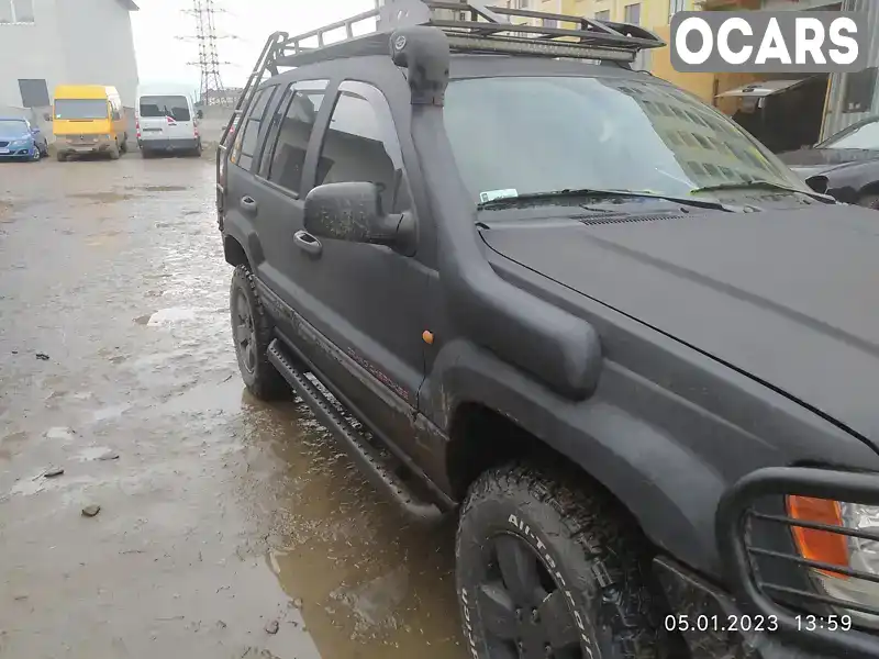 1J8G2E8A94Y102593 Jeep Grand Cherokee 2003 Внедорожник / Кроссовер 2.69 л. Фото 2