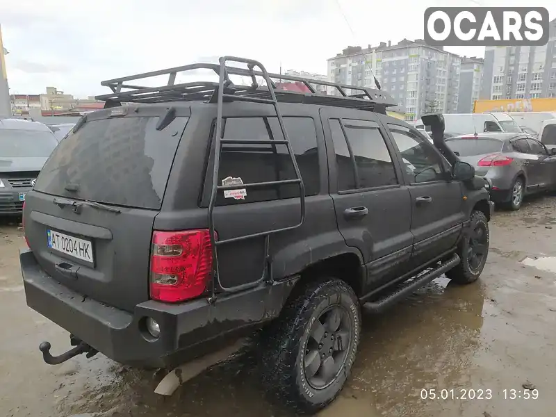 1J8G2E8A94Y102593 Jeep Grand Cherokee 2003 Внедорожник / Кроссовер 2.69 л. Фото 3