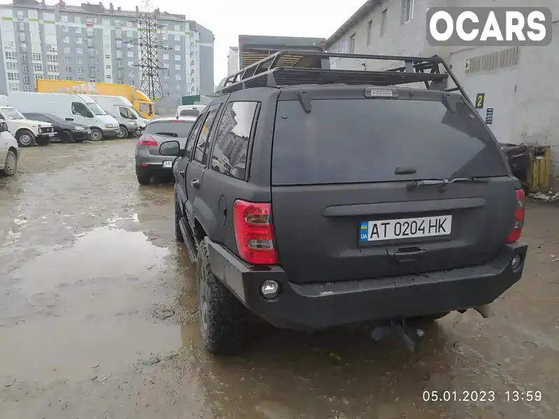 1J8G2E8A94Y102593 Jeep Grand Cherokee 2003 Внедорожник / Кроссовер 2.69 л. Фото 4