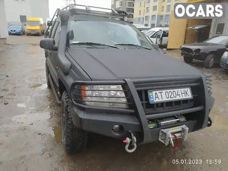 1J8G2E8A94Y102593 Jeep Grand Cherokee 2003 Внедорожник / Кроссовер 2.69 л. Фото 5