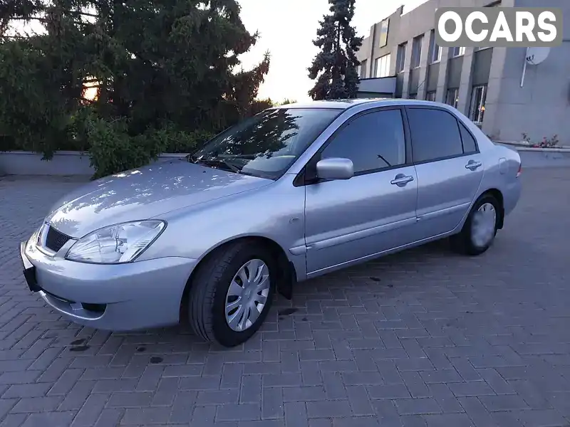 Седан Mitsubishi Lancer 2006 1.6 л. Ручная / Механика обл. Николаевская, Новая Одесса - Фото 1/21