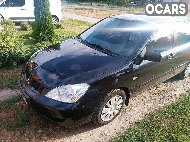 Седан Mitsubishi Lancer 2008 1.6 л. Автомат обл. Полтавська, Кременчук - Фото 1/11