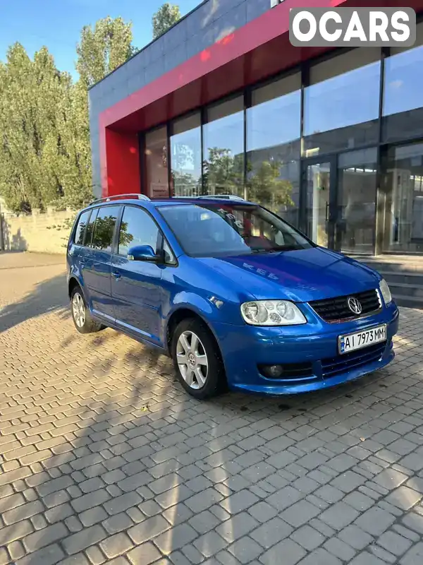 Мінівен Volkswagen Touran 2004 1.6 л. Автомат обл. Київська, Київ - Фото 1/21