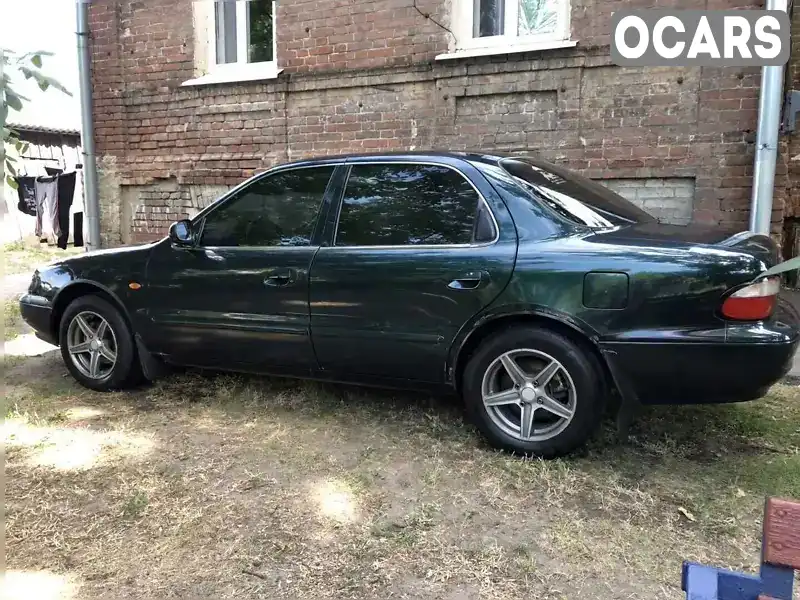 Седан Kia Clarus 1998 1.8 л. Ручная / Механика обл. Харьковская, Харьков - Фото 1/9