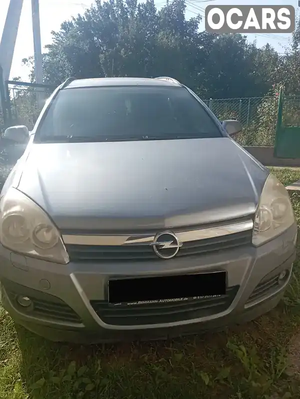 W0L0AHL3562098249 Opel Astra 2006 Универсал 1.82 л. Фото 1