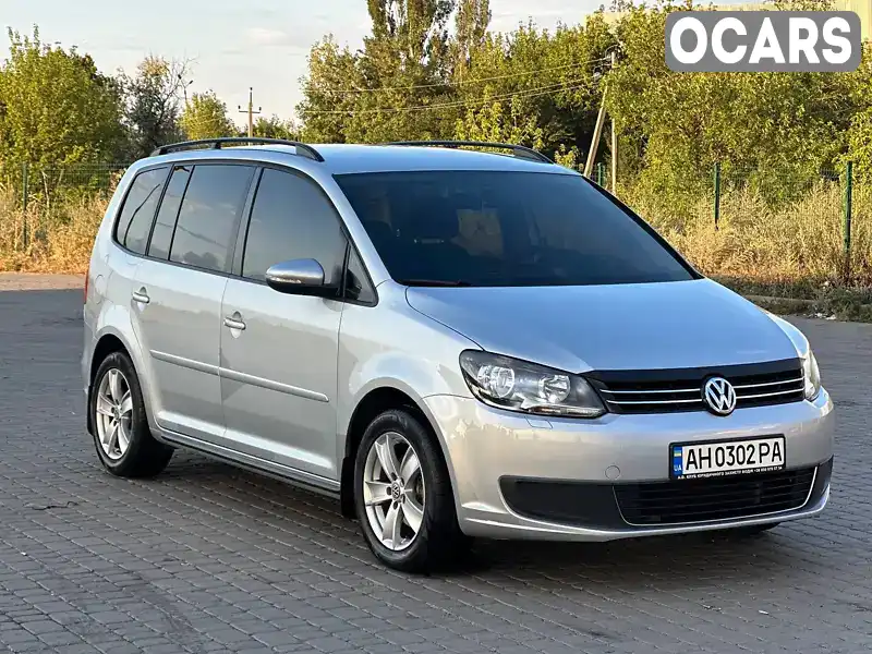 Мінівен Volkswagen Touran 2011 1.6 л. Ручна / Механіка обл. Донецька, Покровськ (Красноармійськ) - Фото 1/21