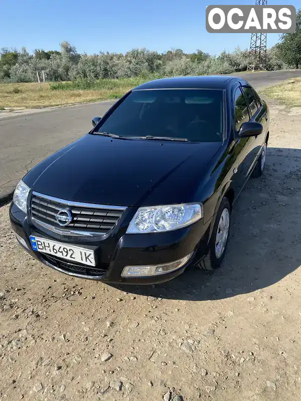 Седан Nissan Almera 2010 1.6 л. Ручна / Механіка обл. Одеська, Болград - Фото 1/11