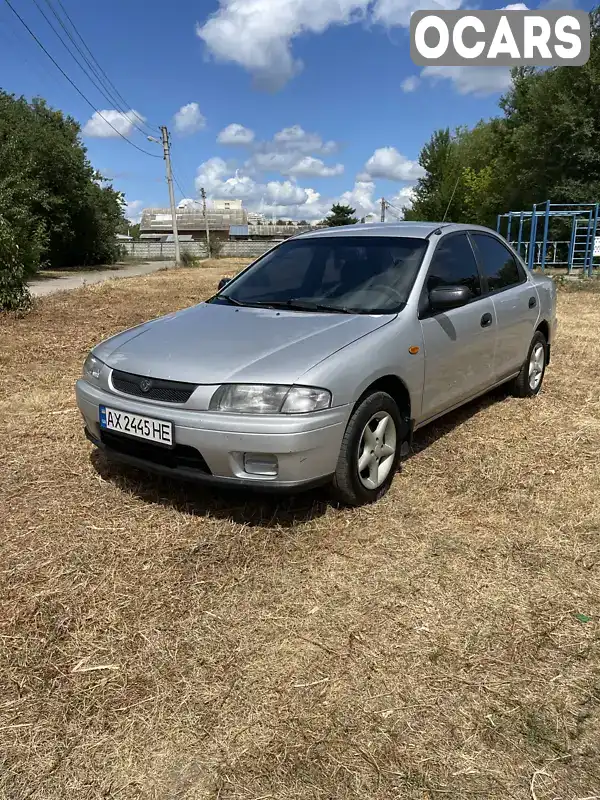 Седан Mazda 323 1998 1.49 л. обл. Харьковская, Харьков - Фото 1/21