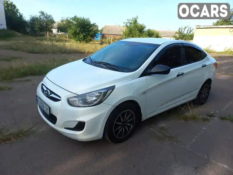 Седан Hyundai Accent 2013 1.4 л. Автомат обл. Київська, Буча - Фото 1/21