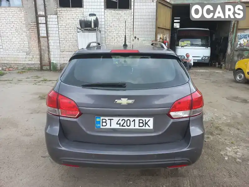 KL1JA3559DK100154 Chevrolet Cruze 2013 Універсал 1.8 л. Фото 1