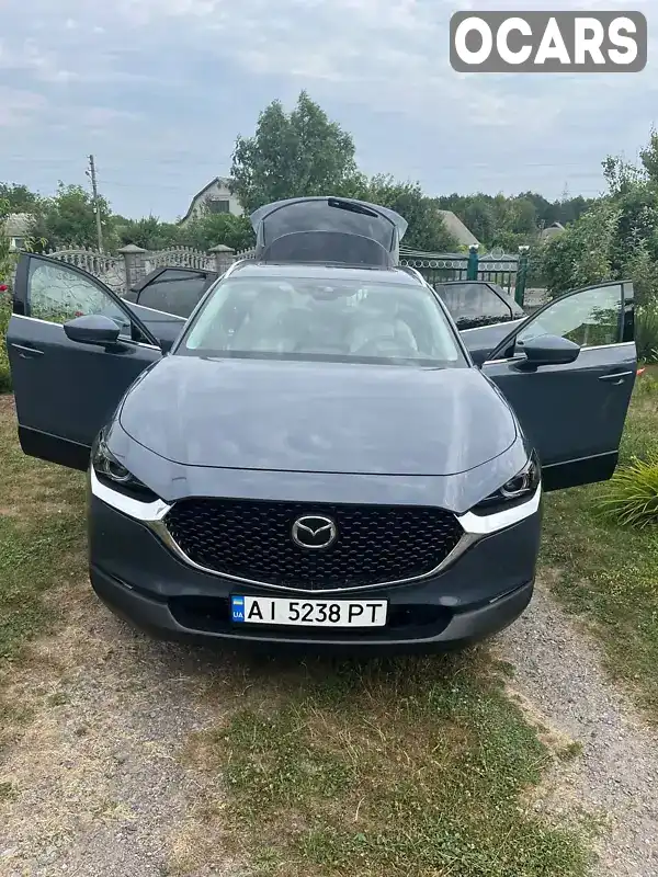 Позашляховик / Кросовер Mazda CX-30 2021 2.49 л. Автомат обл. Київська, Вишневе - Фото 1/14