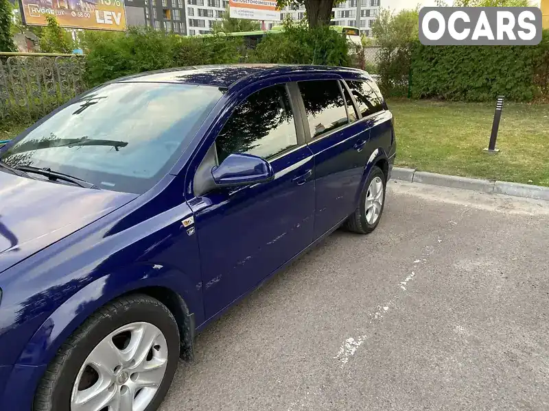 W0L0AHL35B2002097 Opel Astra 2010 Універсал 1.3 л. Фото 1