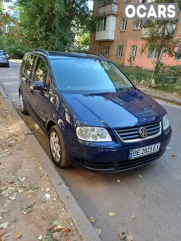 Мінівен Volkswagen Touran 2006 1.9 л. Ручна / Механіка обл. Миколаївська, Миколаїв - Фото 1/21