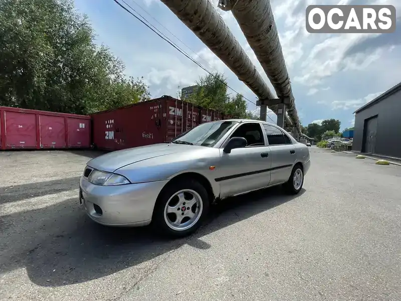 Ліфтбек Mitsubishi Carisma 1998 1.6 л. Ручна / Механіка обл. Київська, Київ - Фото 1/21