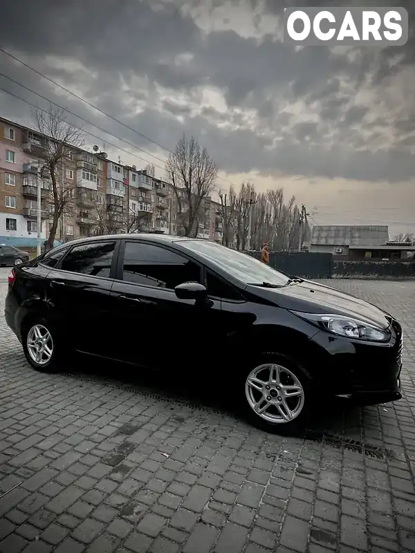 Седан Ford Fiesta 2017 1.6 л. Автомат обл. Дніпропетровська, Кам'янське (Дніпродзержинськ) - Фото 1/6