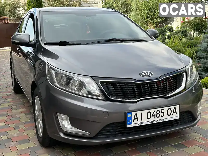 Седан Kia Rio 2012 1.59 л. Автомат обл. Киевская, Рокитное - Фото 1/14