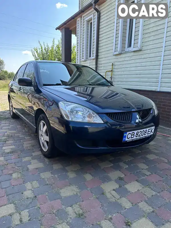 Седан Mitsubishi Lancer 2004 1.3 л. Ручна / Механіка обл. Чернігівська, Чернігів - Фото 1/16