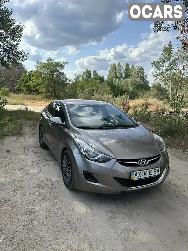 KMHDH41CADU747549 Hyundai Elantra 2013 Седан 1.59 л. Фото 2