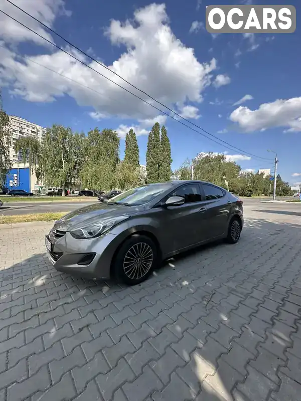 KMHDH41CADU747549 Hyundai Elantra 2013 Седан 1.59 л. Фото 5