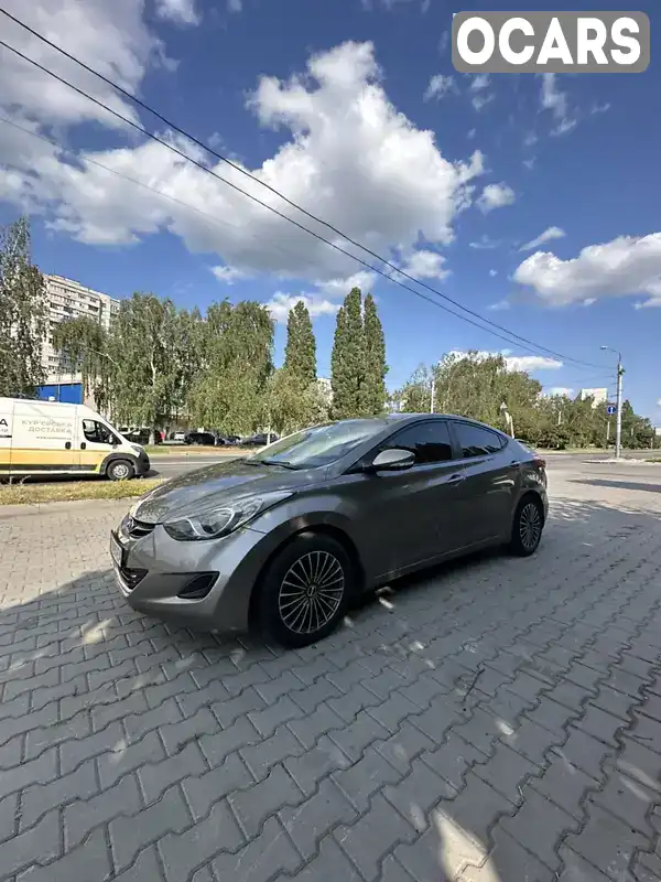 KMHDH41CADU747549 Hyundai Elantra 2013 Седан 1.59 л. Фото 6