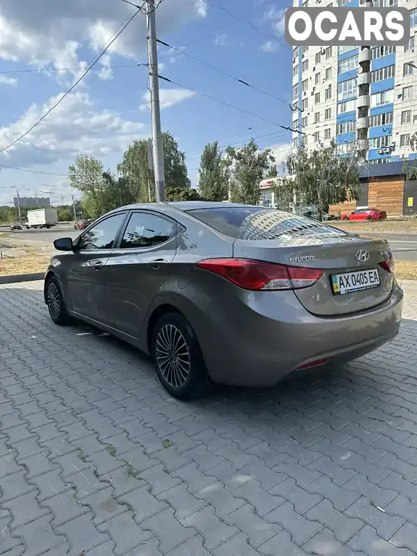 KMHDH41CADU747549 Hyundai Elantra 2013 Седан 1.59 л. Фото 7