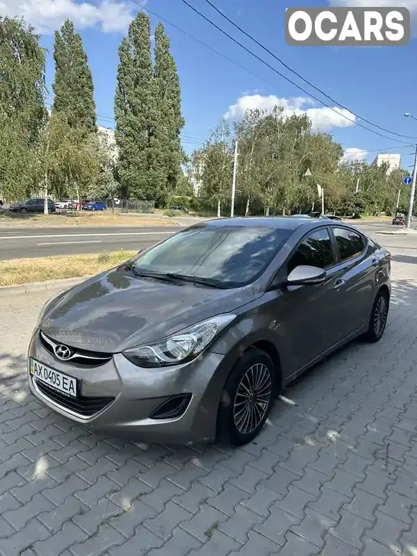 KMHDH41CADU747549 Hyundai Elantra 2013 Седан 1.59 л. Фото 8