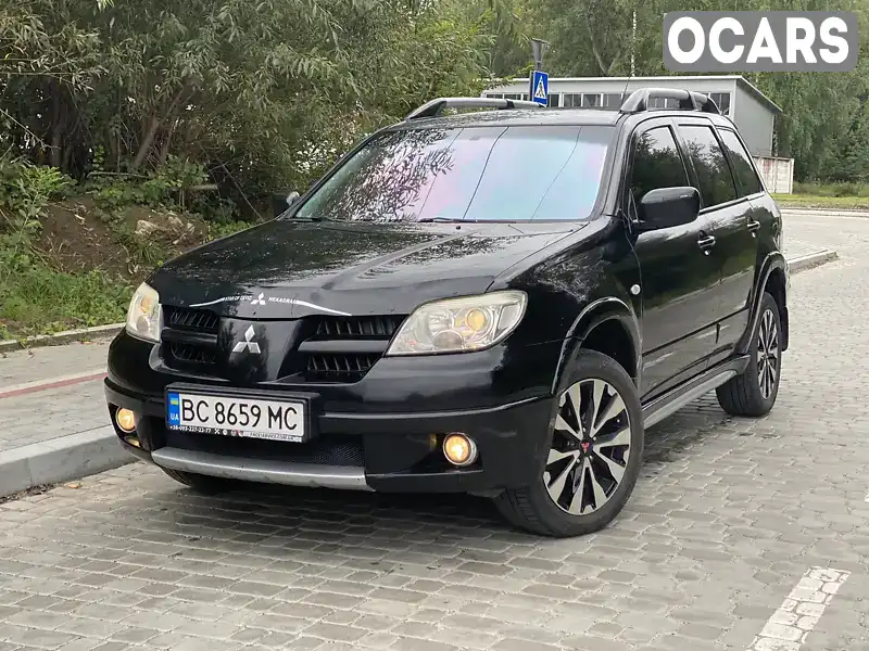 Внедорожник / Кроссовер Mitsubishi Outlander 2007 2.4 л. Автомат обл. Львовская, Новояворовск - Фото 1/21