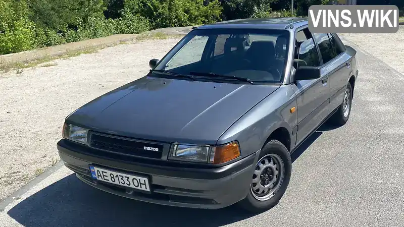 Седан Mazda 323 1991 1.3 л. Ручна / Механіка обл. Дніпропетровська, Дніпро (Дніпропетровськ) - Фото 1/14