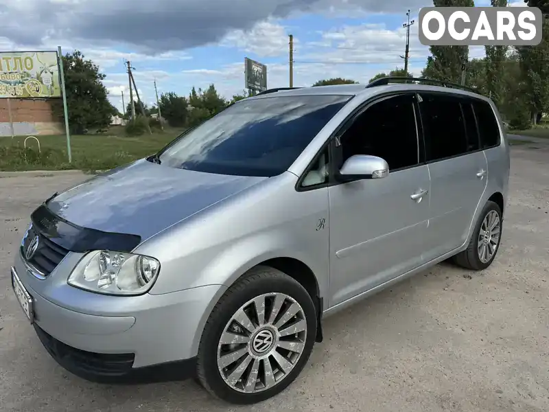 Мінівен Volkswagen Touran 2006 1.9 л. обл. Сумська, Кролевець - Фото 1/21