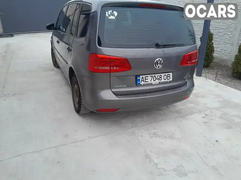 Мінівен Volkswagen Touran 2010 2 л. Ручна / Механіка обл. Дніпропетровська, Дніпро (Дніпропетровськ) - Фото 1/8